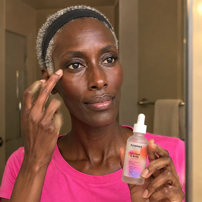 Finones serum dropped into a palm